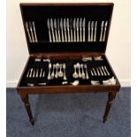 ARTHUR PRICE PART CANTEEN OF CUTLERY in the county plate pattern, contained in a fitted mahogany