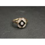 ART DECO STYLE ENAMEL AND DIAMOND RING the central bezel set diamond approximately 0.07cts in a