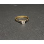 ILLUSION SET DIAMOND SINGLE STONE RING on eighteen carat gold shank with platinum setting, the
