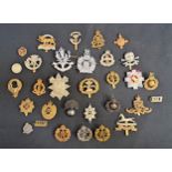 SELECTION OF MILITARY REGIMENTAL BADGES including The Glasgow Highlanders, Royal Marines, Royal