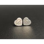 PAIR OF TIFFANY & CO. RETURN TO TIFFANY SILVER HEART TAG STUD EARRINGS Note: only one stud has the