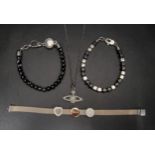 SELECTION OF FASHION JEWELLERY comprising a Fossil square beaded bracelet, a Diesel banded agate