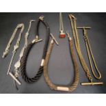 SELECTION OF ALBERT, GUARD AND CHATELAINE CHAINS comprising a guard chain with seal fob, a gilt