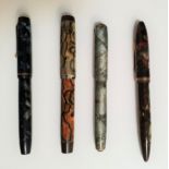 FOUR VINTAGE FOUNTAIN PENS comprising a Parker Duofold Senior Streamline in black and pearl
