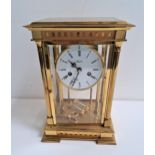 ANGELUS FOUR GLASS REGULATOR MANTLE CLOCK with a circular enamel dial with Roman numerals and an