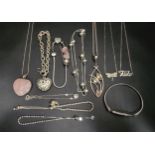 SELECTION OF SILVER JEWELLERY including beaded bracelets, a chain bracelet with a heart charm, a