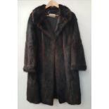 LADIES FULL LENGTH MINK COAT with a retailers label for 'D. McComiskey of Glasgow'