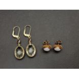 TWO PAIRS OF NINE CARAT GOLD MOUNTED EARRINGS comprising a pair of gem set drop earrings with