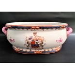 CHINESE FOOT BATH with an armorial crest and floral decoration to the exterior, the interior