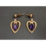 PAIR OF AMETHYST AND SEED PEARL EARRINGS the oval cut amethysts approximately 1.2cts each, in