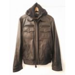 SCHOTT BLACK LEATHER JACKET with a part fleece lining, eight exterior pockets and four interior
