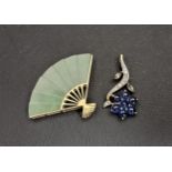 TWO NINE CARAT GOLD PENDANTS one in the form of a fan with carved jade coloured hardstone leaf, 2.