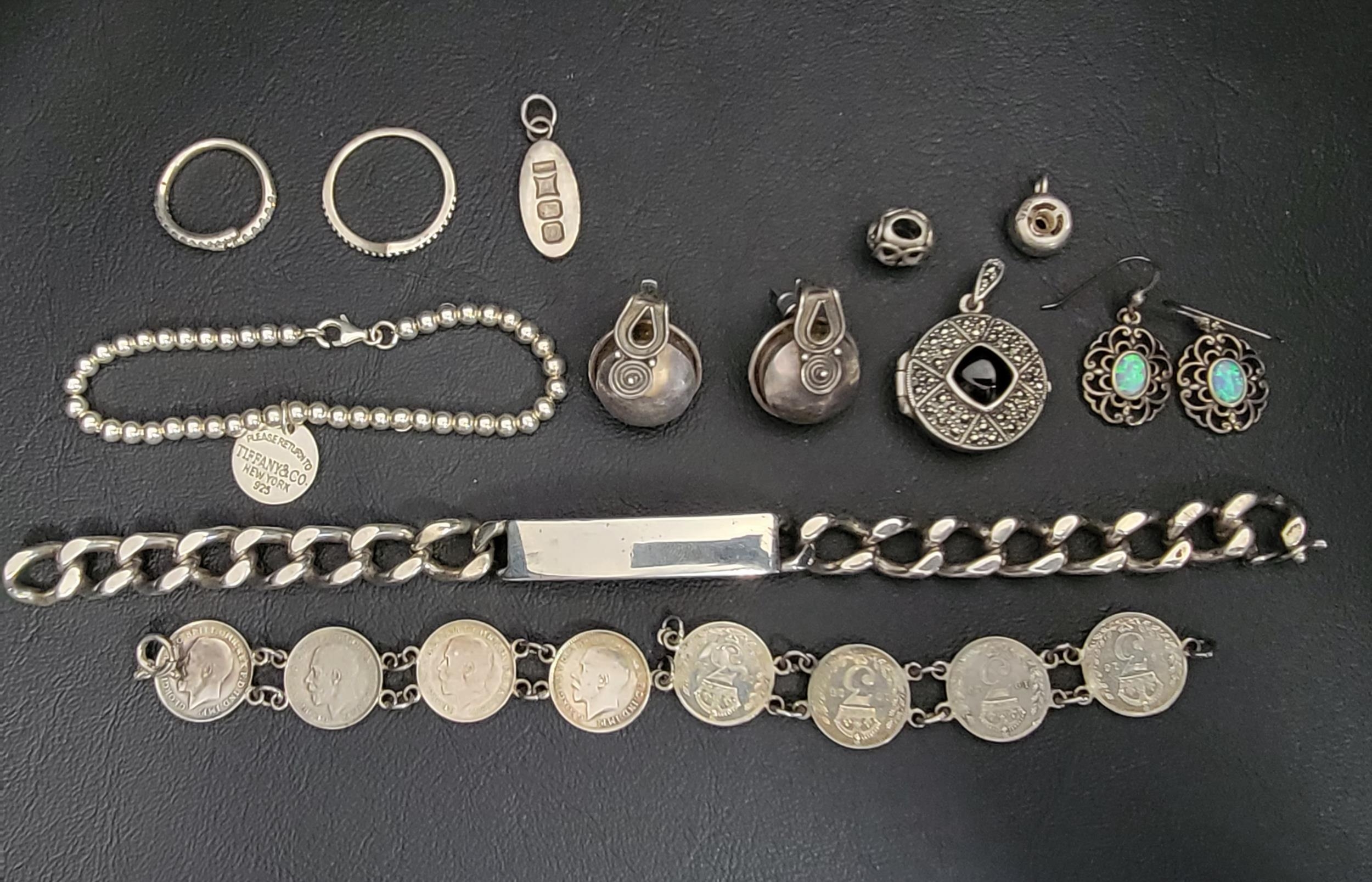 GOOD SELECTION OF SILVER JEWELLERY comprising a heavy silver identity bracelet (with no engraving to