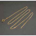 GOLD FIGARO NECK CHAIN approximately 3.4 grams and 50cm long Note: the chain by the clasp is broken