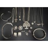 SELECTION OF SILVER JEWELLERY including a cuff bracelet, a bangle with safety hook, clip on