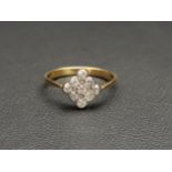 DIAMOND CLUSTER RING the diamonds in rhombus shaped setting totalling approximately 0.36cts, on