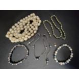 SELECTION OF PEARL JEWELLERY comprising a long individually knotted white pearl necklace, 120cm