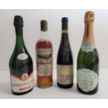 FOUR BOTTLES OF VINTAGE WINE AND CHAMPAGNE comprising a bottle of Bel-Enclos Graves dry Bordeaux