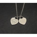 TIFFANY & CO. SILVER MINI DOUBLE HEART TAG PENDANT on a Tiffany & Co. silver chain