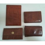 SELECTION OF MULBERRY LEATHER ITEMS comprising a passport cover, a key holder , a purse and a nail