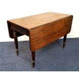 19th CENTURY MAHOGANY PEMBROKE TABLE with shaped drop flaps above a frieze drawer and an opposing