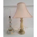 TWO TABLE LAMPS one carved geometric onyx lamp with a cream shade, approximately 64cm high; and a