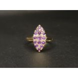 ATTRACTIVE AMETHYST CLUSTER RING the multi amethysts set in marquise shaped setting, in all