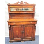 LATE VICTORIAN ROSEWOOD CHIFFONIER the shaped raised back with a rectangular bevelled mirror with