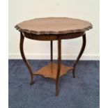 EDWARDIAN MAHOGANY WINDOW TABLE now overpainted, with a shaped top on slender supports with a