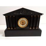 VICTORIAN BLACK SLATE MANTLE CLOCK styled as a Greek temple, the frieze decorated with Britannia
