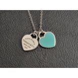 TIFFANY & CO. RETURN TO TIFFANY BLUE DOUBLE HEART TAG SILVER NECKLACE on a Tiffany & Co. silver