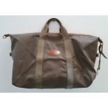 MULBERRY SCOTCHGRAIN TRAVEL BAG with canvas and leather trimmed handles, zip closure and tartan