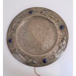 ARTS AND CRAFTS PEWTER CHARGER in the style of Liberty, with hammered decoration, the rim