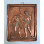 20th CENTURY RELIEF DECORATED COPPER RELIGIOUS PLAQUE depicting a man holding a cross and with a