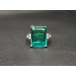 EMERALD DOUBLET AND DIAMOND DRESS RING the emerald cut emerald doublet measuring approximately 15.