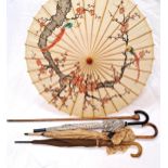 THREE UMBRELLAS, A PARASOL AND A WALKING STICK the Chinese parasol with hand painted canopy