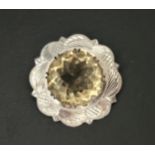 LARGE CITRINE SET SILVER BROOCH the central round cut citrine measuring approximately 24mm x 24mm