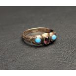 VICTORIAN TURQUOISE AND PURPLE GLASS SET RING on nine carat gold shank with decorative scroll