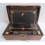 EDWARDIAN WALNUT WRITING SLOPE with brass edging and an inset presentation plaque, the fitted