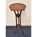 MAHOGANY AND INLAID JARDINERE STAND with a circular dished top on three shaped and inlaid supports