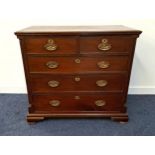 GEORGE III MAHOGANY BACHELORS CHEST OF DRAWERS with a moulded top above two short and three long