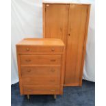 C.W.S. LTD WARDROBE AND MATCHING CHEST OF DRAWERS the wardrobe with a pair of shaped doors opening