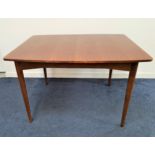 LEBUS TEAK DINING TABLE with a pull apart top, standing on turned tapering supports, 76.5cm x 122cm