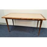 BEECH FRAMED DINING TABLE with an inset faux marble tiled top, standing on turned tapering supports,