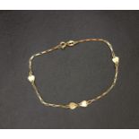 PRETTY EIGHTEEN CARAT GOLD BRACELET the chain bracelet with intermittent gold hearts,