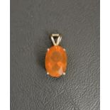 ATTRACTIVE FIRE OPAL PENDANT the oval cut fire opal measuring approximately 14.2mm x 9.6mm x 6.7mm