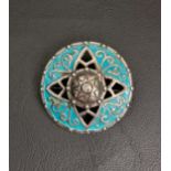 ALEXANDER RITCHIE SILVER AND TURQUOISE ENAMEL SHIELD BROOCH with pierced decoration, cast mark 'IONA