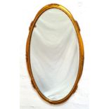 OVAL WALL MIRROR with a giltwood frame and bevelled plate, 73cm high