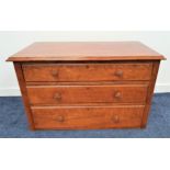 OAK LOW CHEST OF DRAWERS with a moulded top above three drawers, standing on a plinth base, 56.5cm x