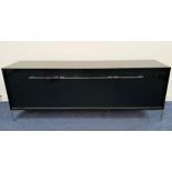 HIGH GLOSS BLACK SIDEBOARD with a rectangular top above three cupboard doors with steel handles,